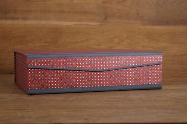 Noble box of red flowers stylized by hand